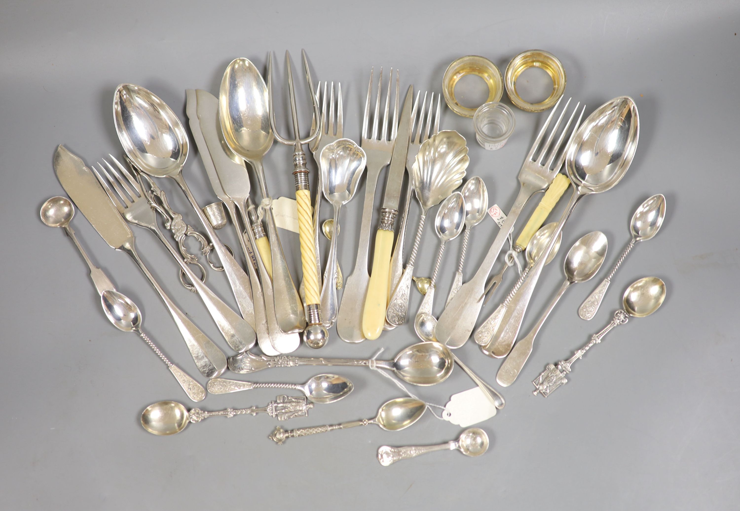 A pair of German 800 gilt white metal salts and a quantity of continental white metal flatware including French, Dutch and Austro-Hungarian, weighable white metal 13oz and a group of plated flatware.